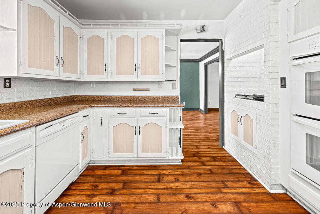 779 Taylor Street Craig, CO 81625 - Photo 28 of 84 a view of a kitchen with white cabinets