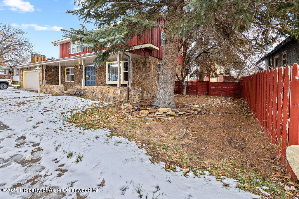 779 Taylor Street Craig, CO 81625 - Photo 4 of 84 a front view of a house with a yard