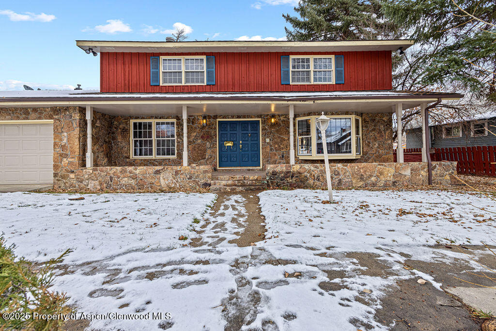 779 Taylor Street Craig, CO 81625 - Photo 5 of 84 a front view of a house with a yard