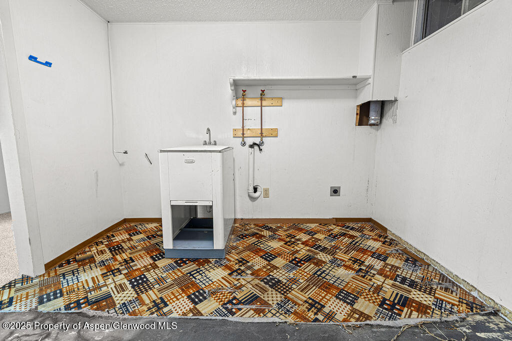 779 Taylor Street Craig, CO 81625 - Photo 51 of 84 a view of a livingroom with wooden floor