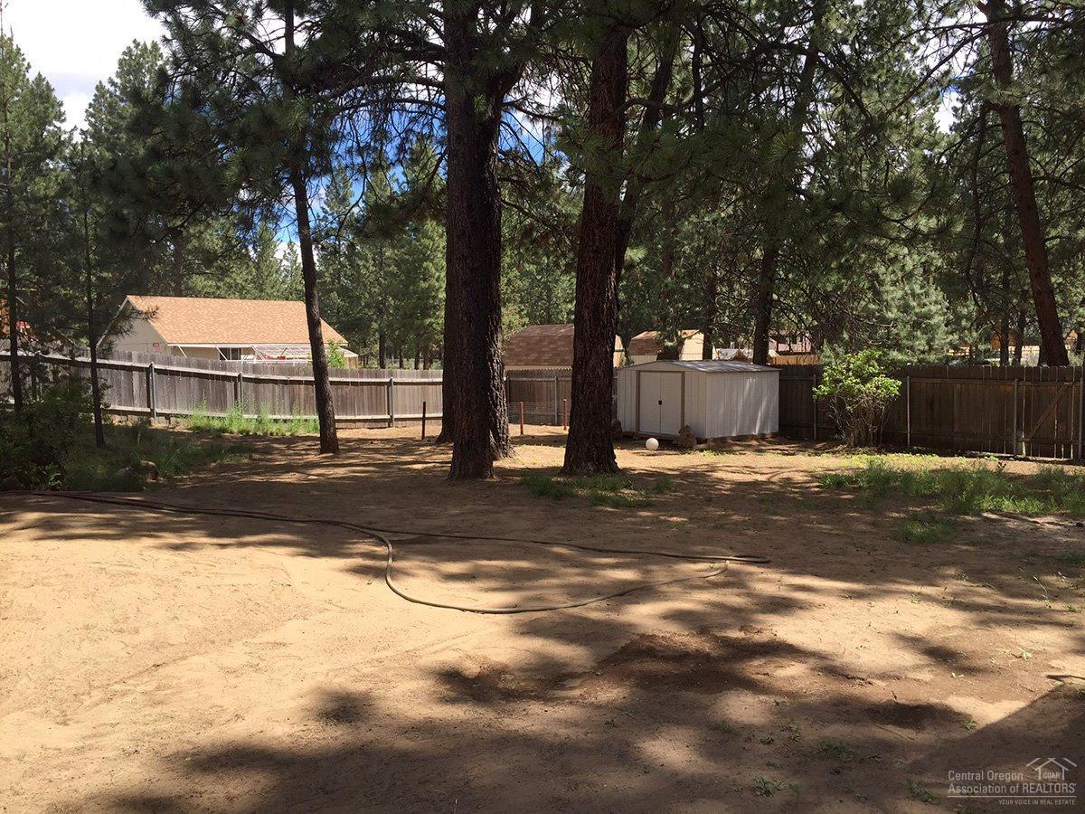 59968 Hopi Road Bend, OR 97702 - Photo 10 of 12 a view of a yard with a large tree