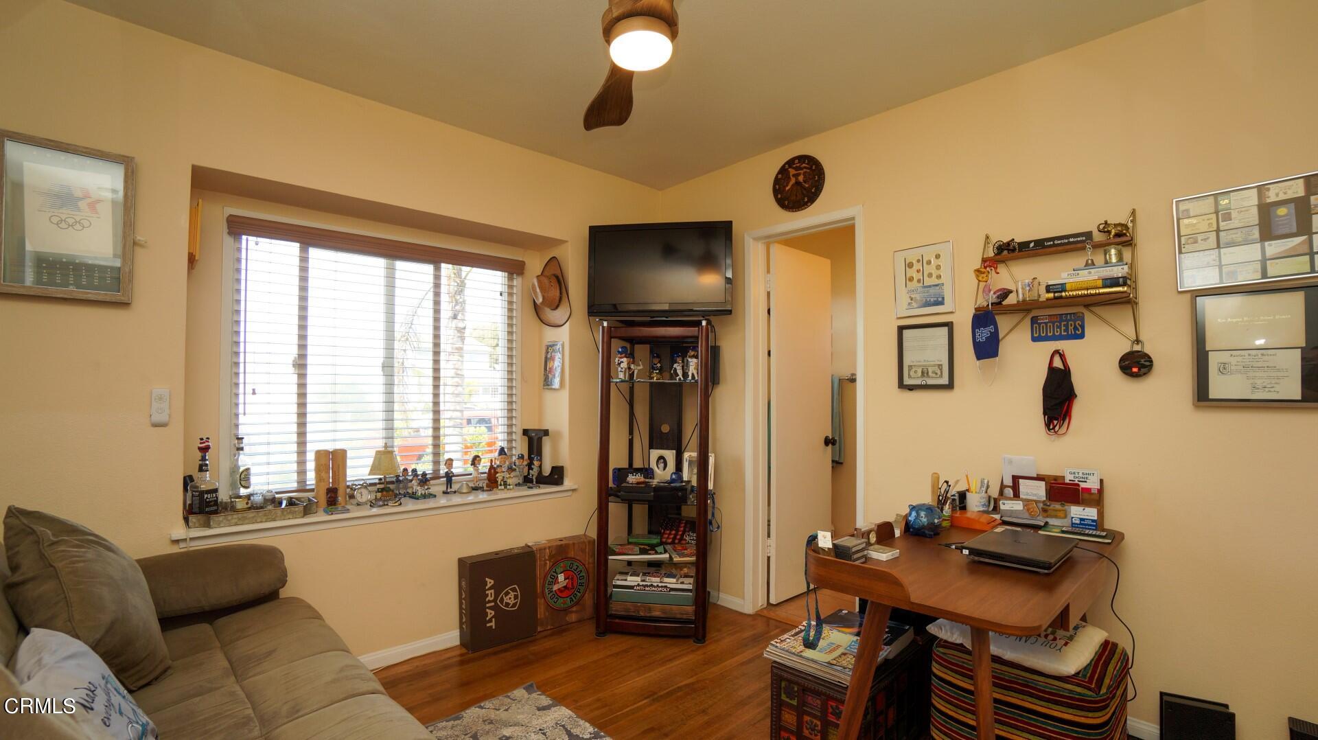 320 West Bard Road Oxnard, CA 93033 - Photo 15 of 21 a living room with furniture and a window