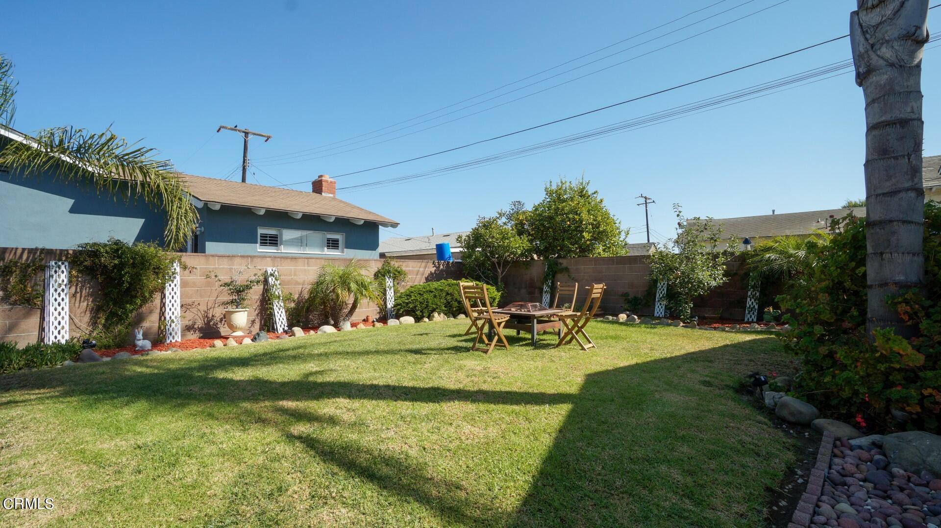 320 West Bard Road Oxnard, CA 93033 - Photo 18 of 21 a view of a house with swimming pool and sitting area