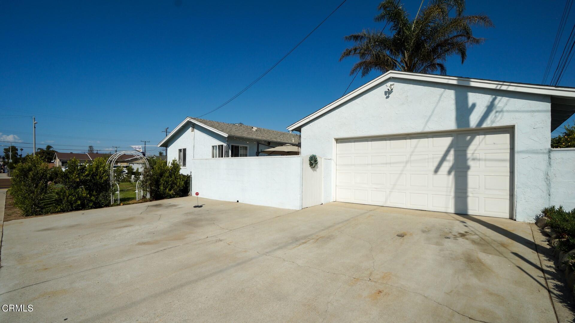 320 West Bard Road Oxnard, CA 93033 - Photo 20 of 21 a view of a house with a street