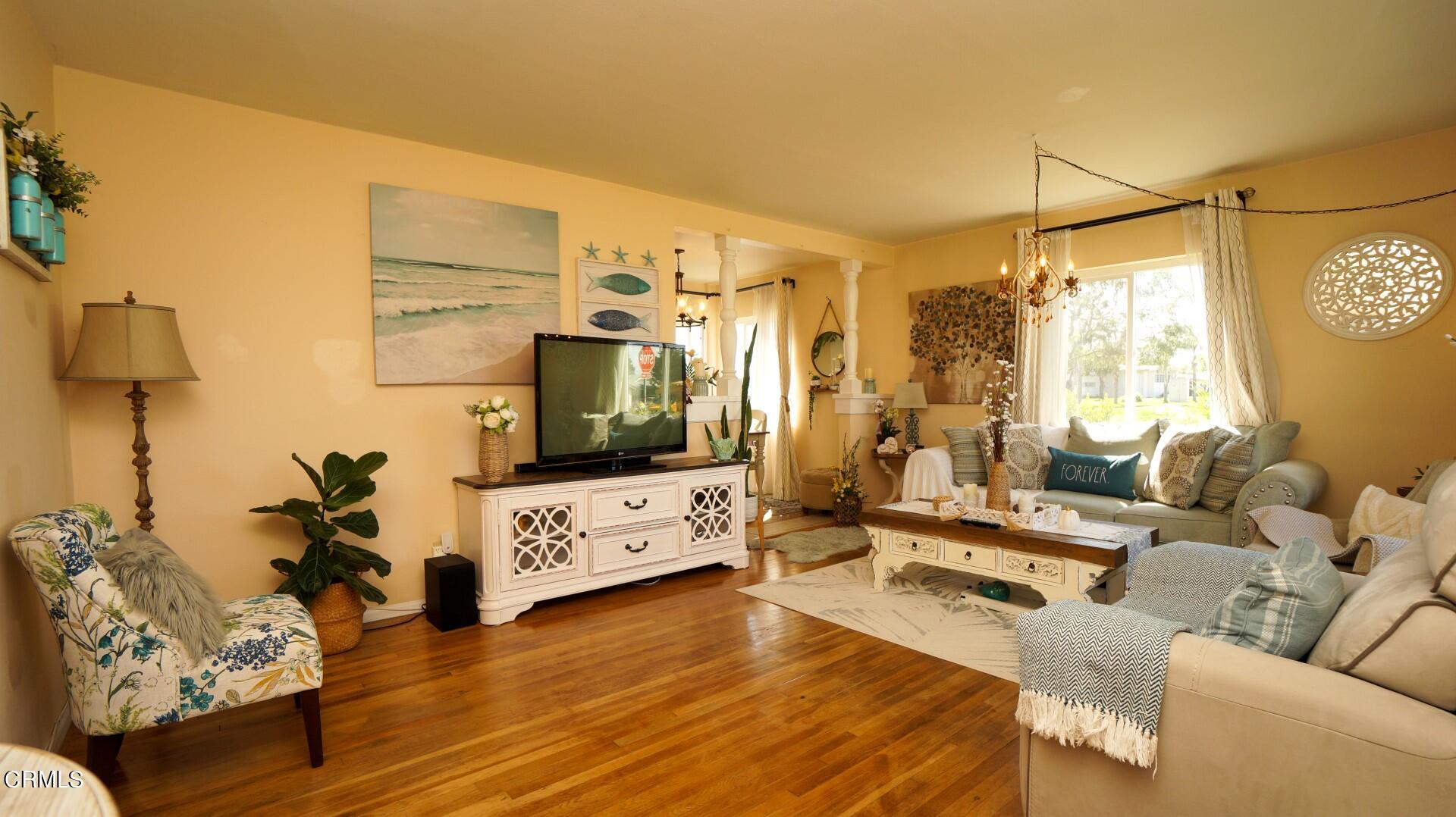 320 West Bard Road Oxnard, CA 93033 - Photo 3 of 21 a living room with furniture and a flat screen tv
