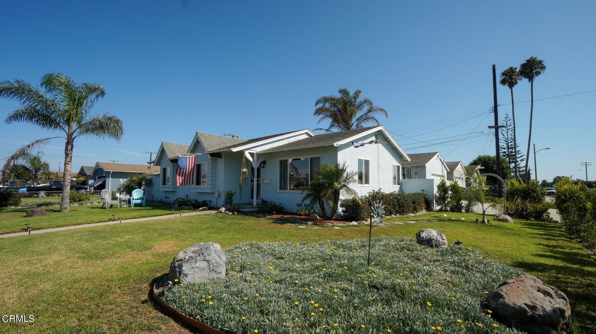 320 West Bard Road Oxnard, CA 93033 - Photo 21 of 21 a front view of a house with garden