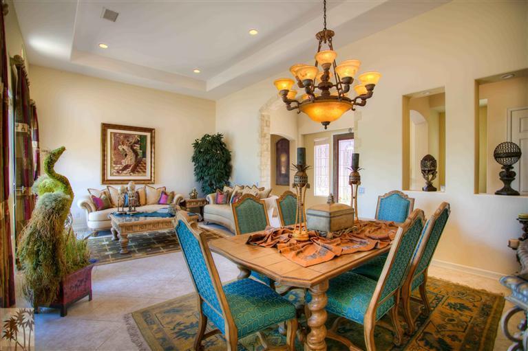 366 Loch Lomond Road Rancho Mirage, CA 92270 - Photo 8 of 25 a view of a dining room with furniture and chandelier