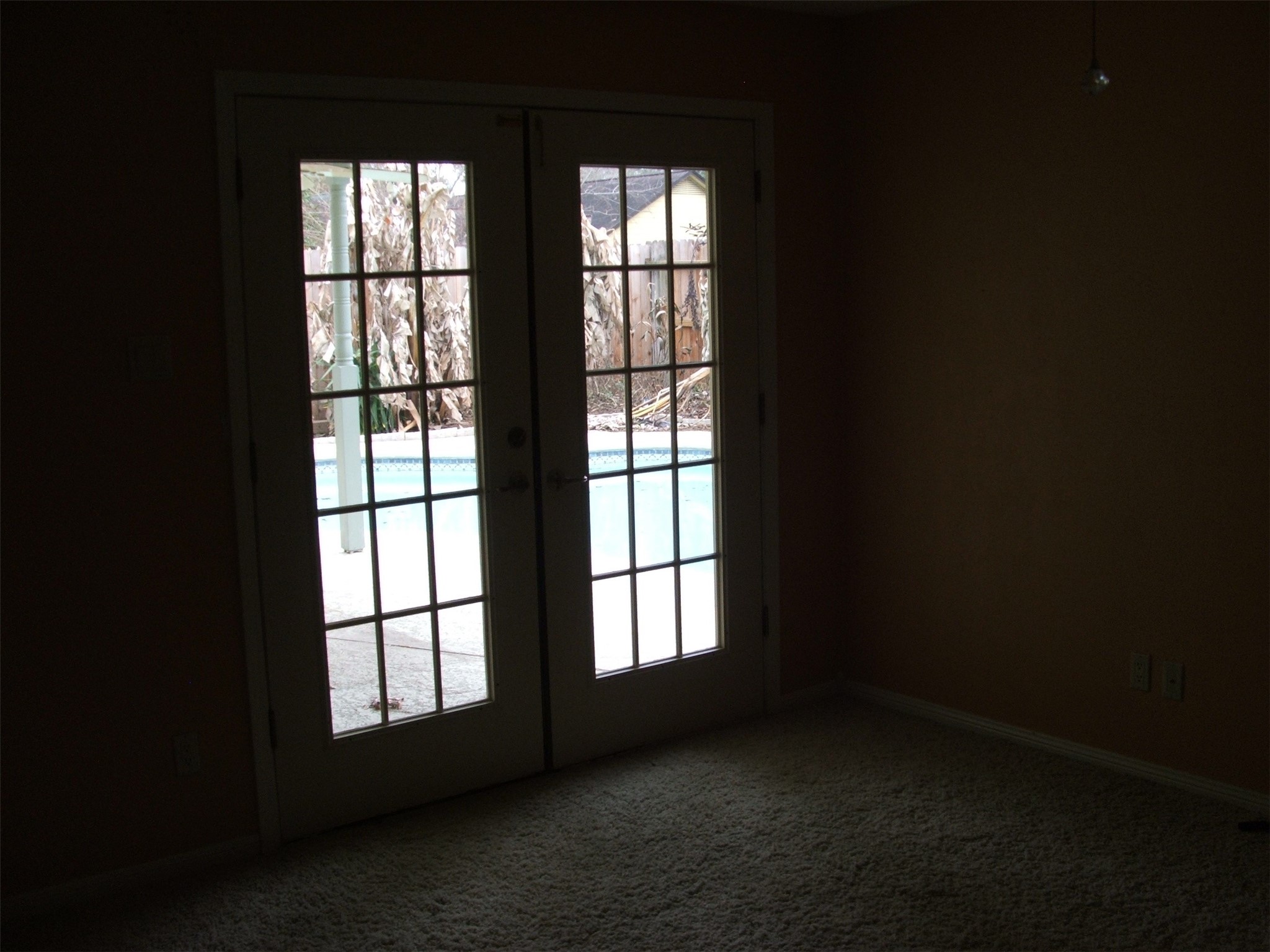 8231 Fernbrook Lane Houston, TX 77070 - Photo 6 of 12 a view of an empty room and window