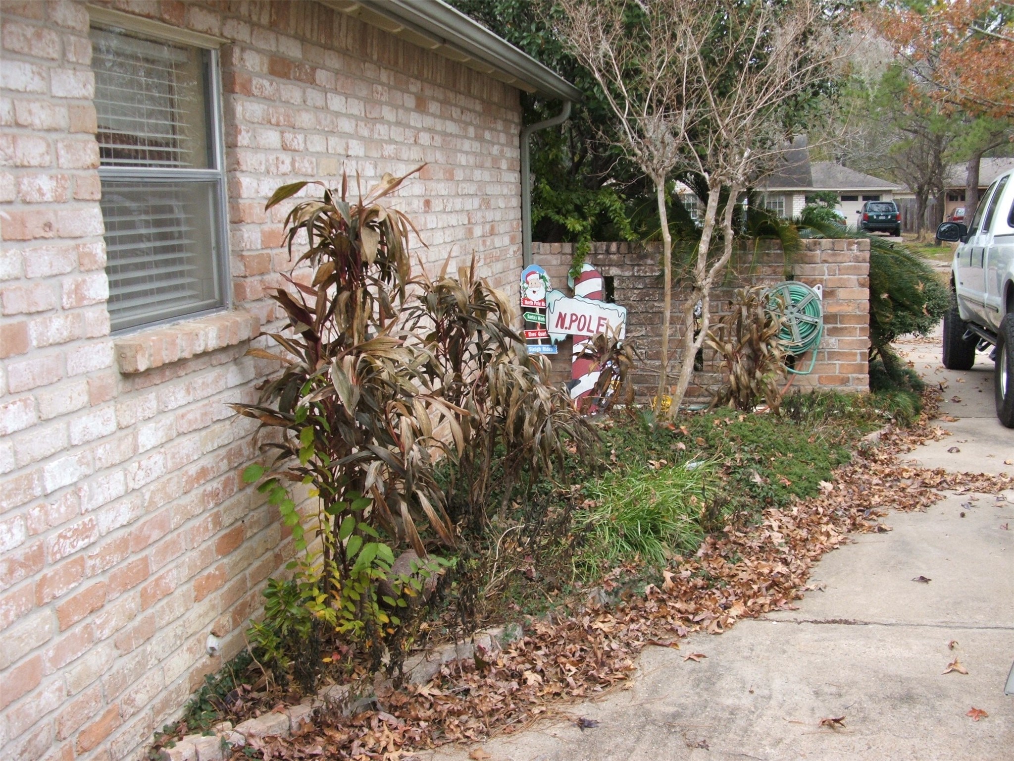 8231 Fernbrook Lane Houston, TX 77070 - Photo 7 of 12 a view of a pathway with a yard