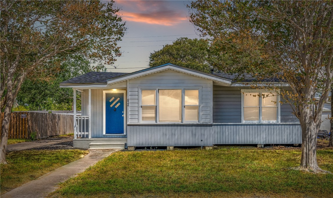 826 Rosedale Drive Corpus Christi, TX 78411 - Photo 2 of 22 a front view of a house with garden