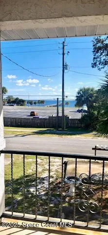 a view of swimming pool with outdoor seating