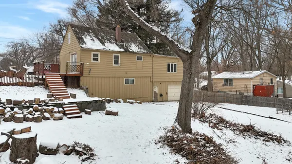 a view of a house covered in snow