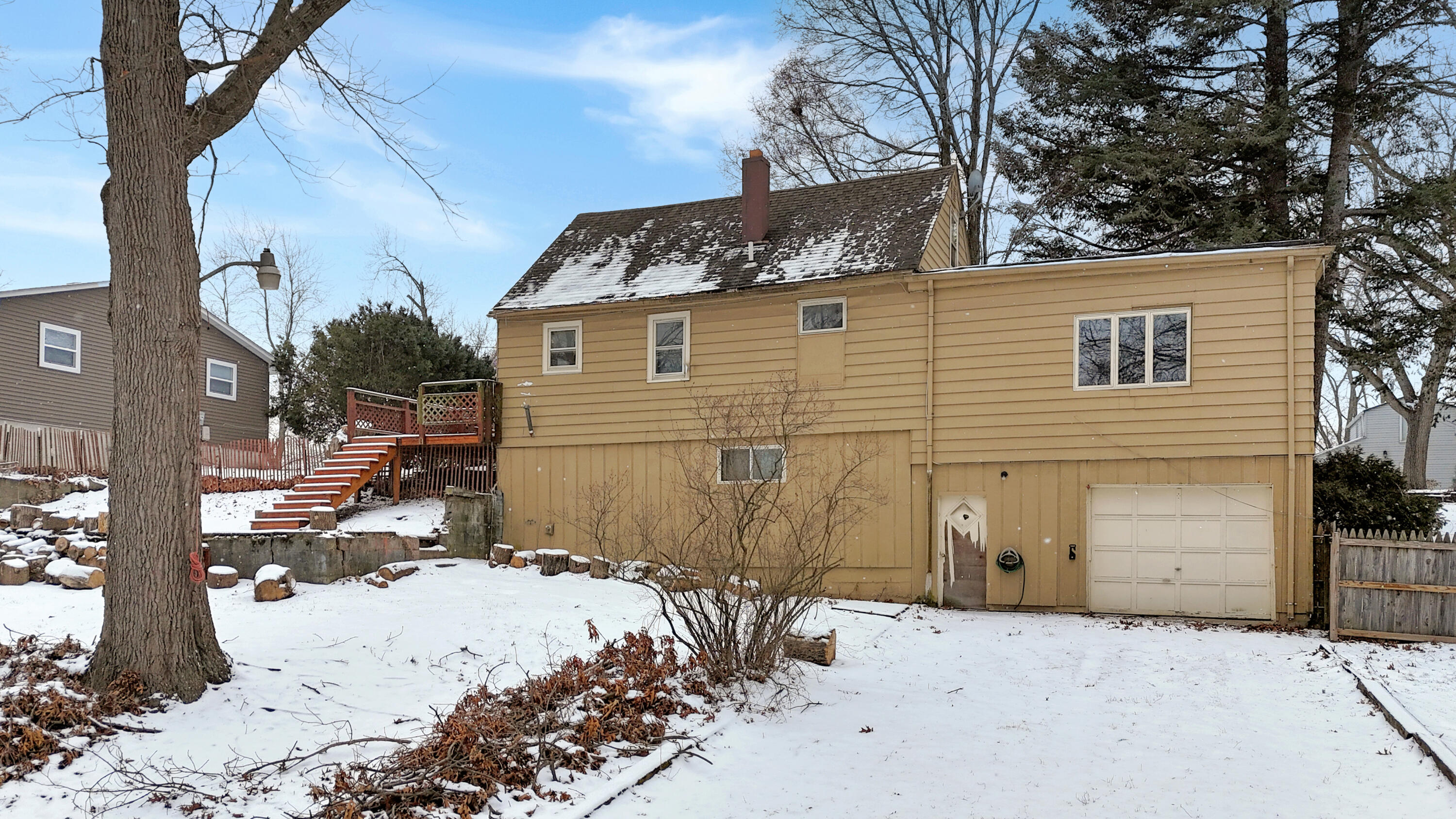 2733 Locust Street Portage, IN 46368 - Photo 18 of 20 a view of a house covered in snow