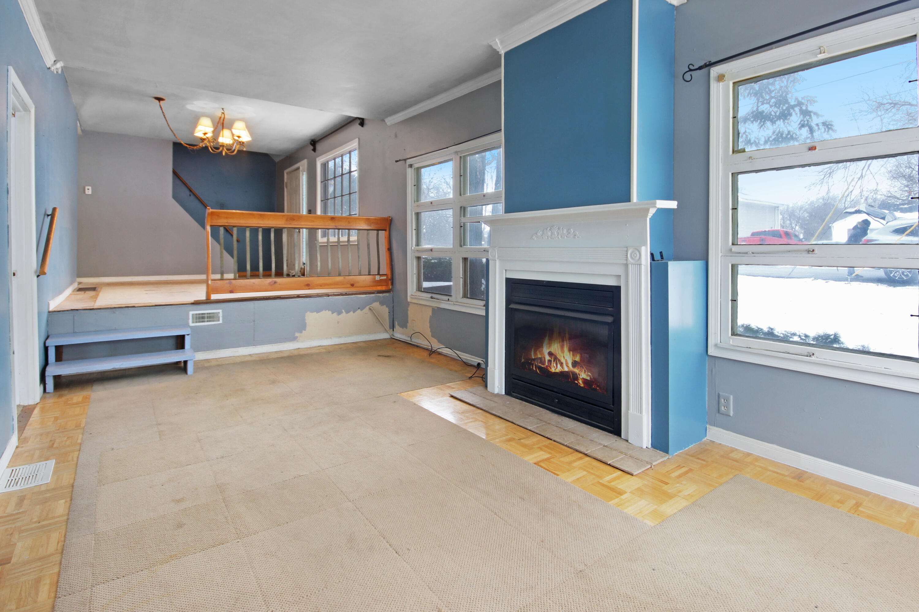 2733 Locust Street Portage, IN 46368 - Photo 5 of 20 a view of an empty room with window and fire place