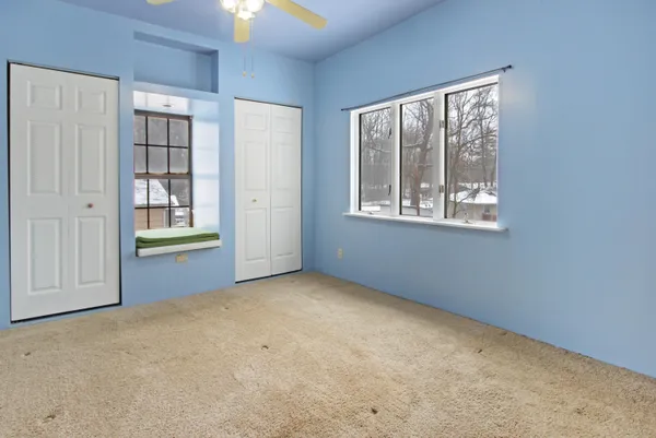 an empty room with windows