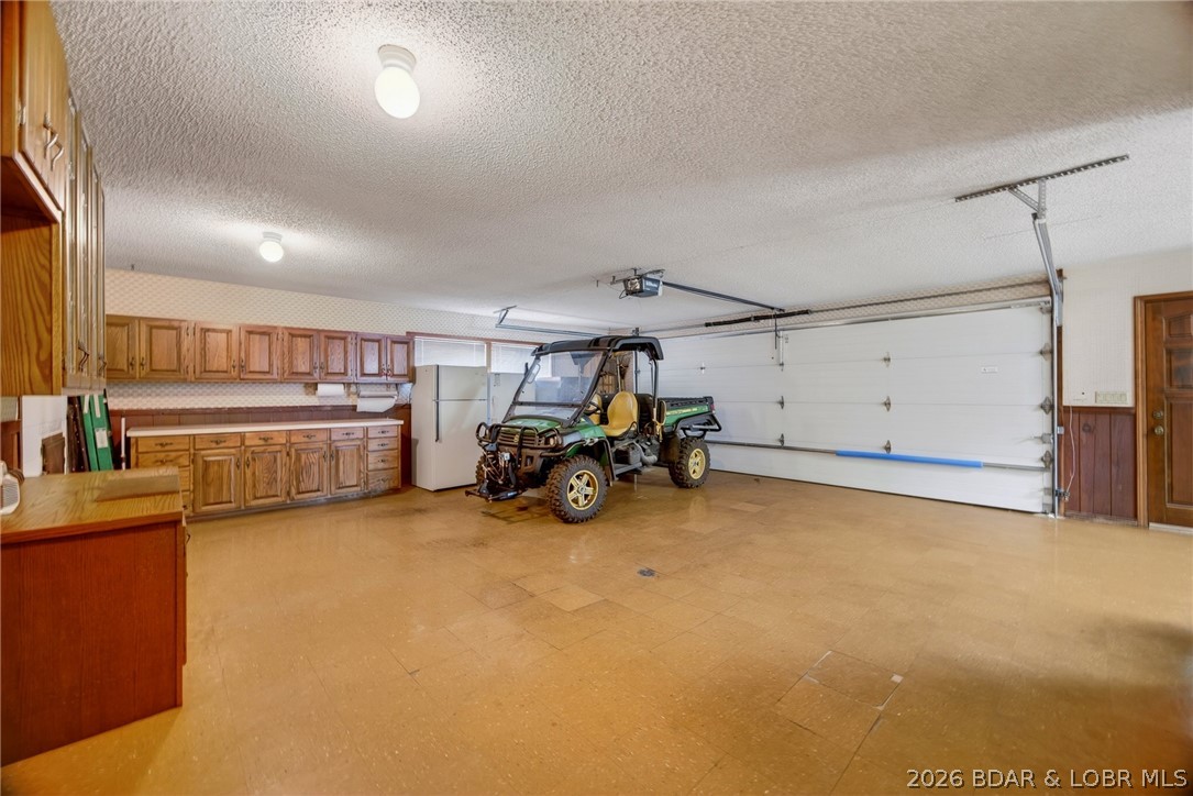 2293 Standing Rock Road Camdenton, MO 65020 - Photo 60 of 99 Spacious Attached 2 1/2 Car Garage Offers a Great