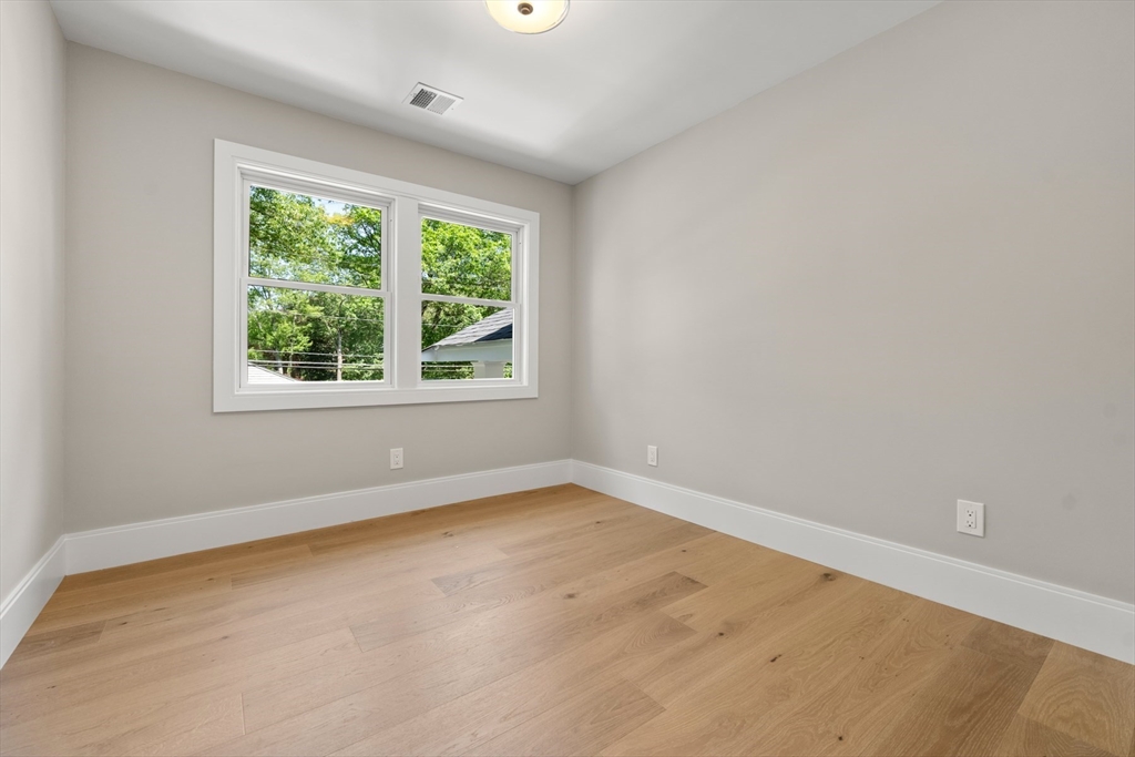 2 Rockwood Road Natick, MA 01760 - Photo 20 of 37 an empty room with a window