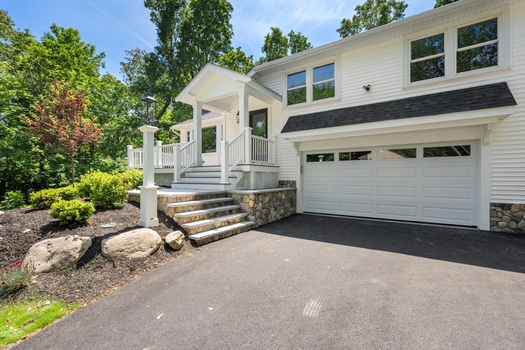2 Rockwood Road Natick, MA 01760 - Photo 36 of 37 a front view of a house with a garage