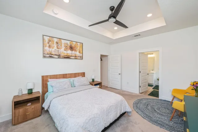 a bedroom with a bed and furniture