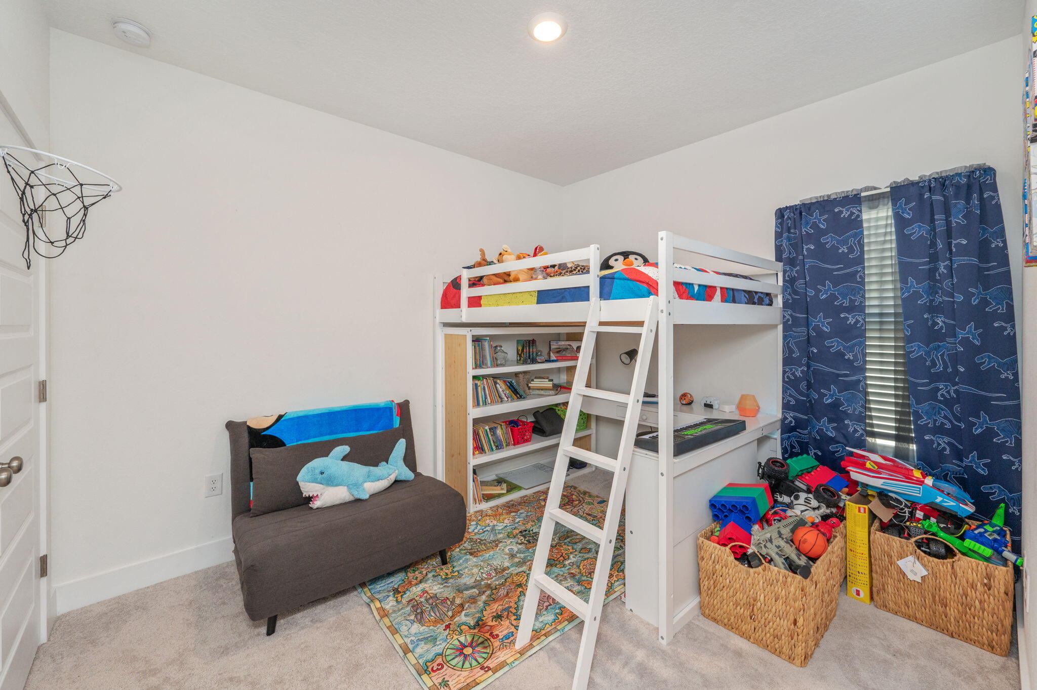 165 Blooming Cove Crestview, FL 32539 - Photo 29 of 44 a bedroom with a bed and a book shelf