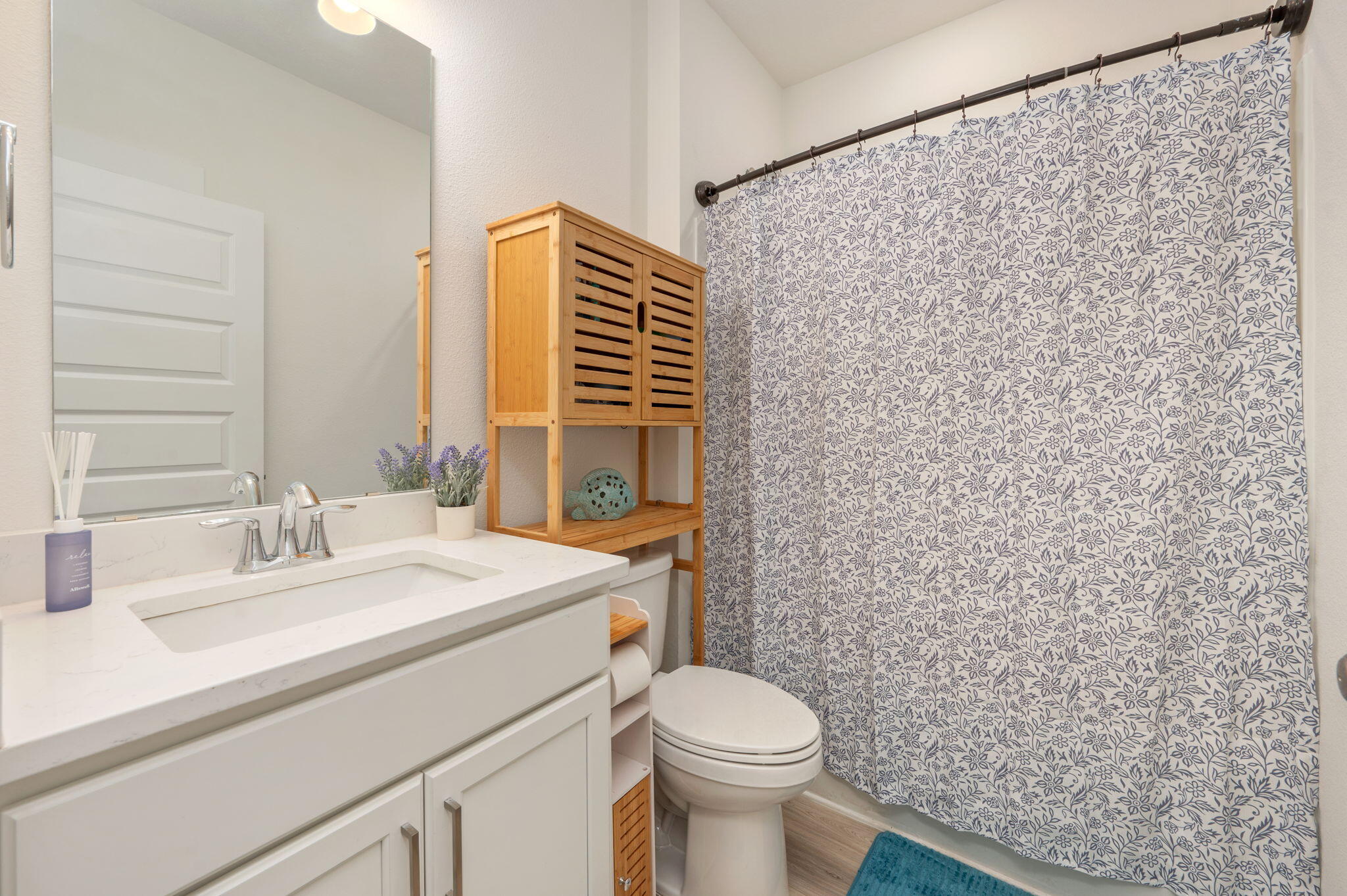 165 Blooming Cove Crestview, FL 32539 - Photo 31 of 44 a bathroom with a sink a toilet and shower curtain