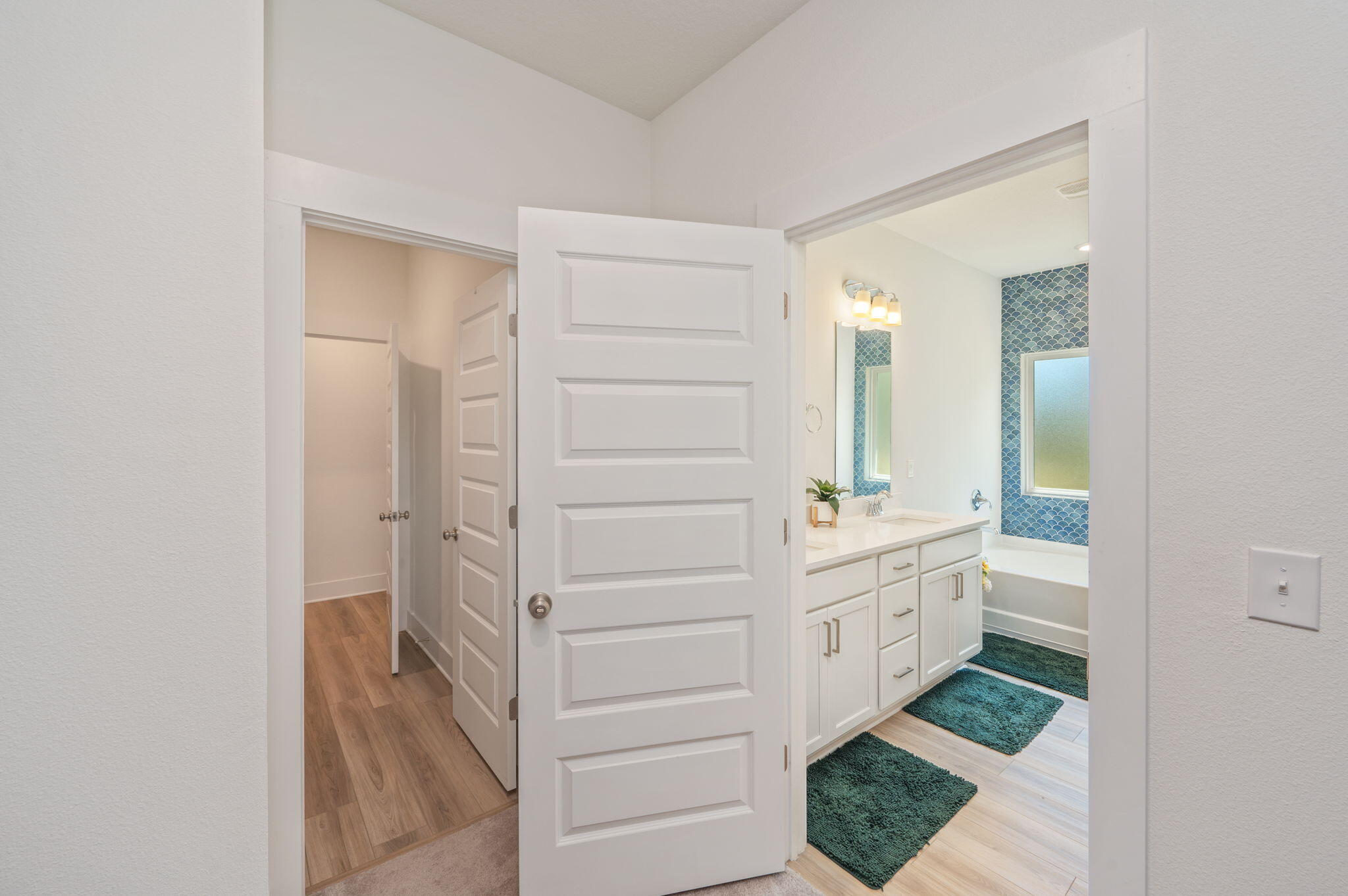 165 Blooming Cove Crestview, FL 32539 - Photo 36 of 44 a bathroom with a vanity and a mirror