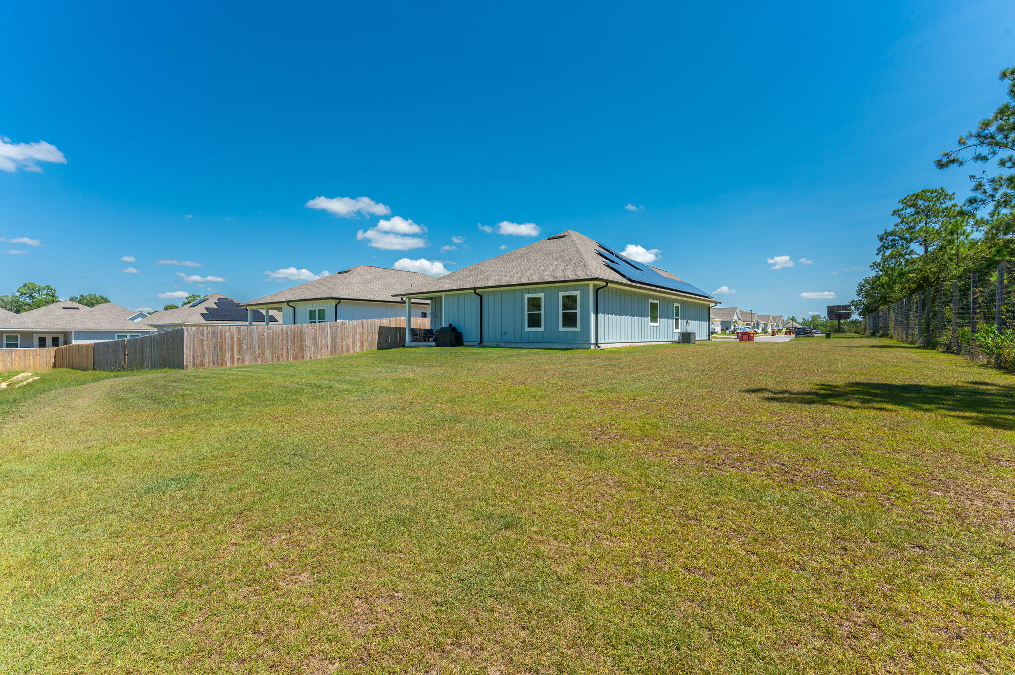 165 Blooming Cove Crestview, FL 32539 - Photo 41 of 44 a view of a house with a big yard