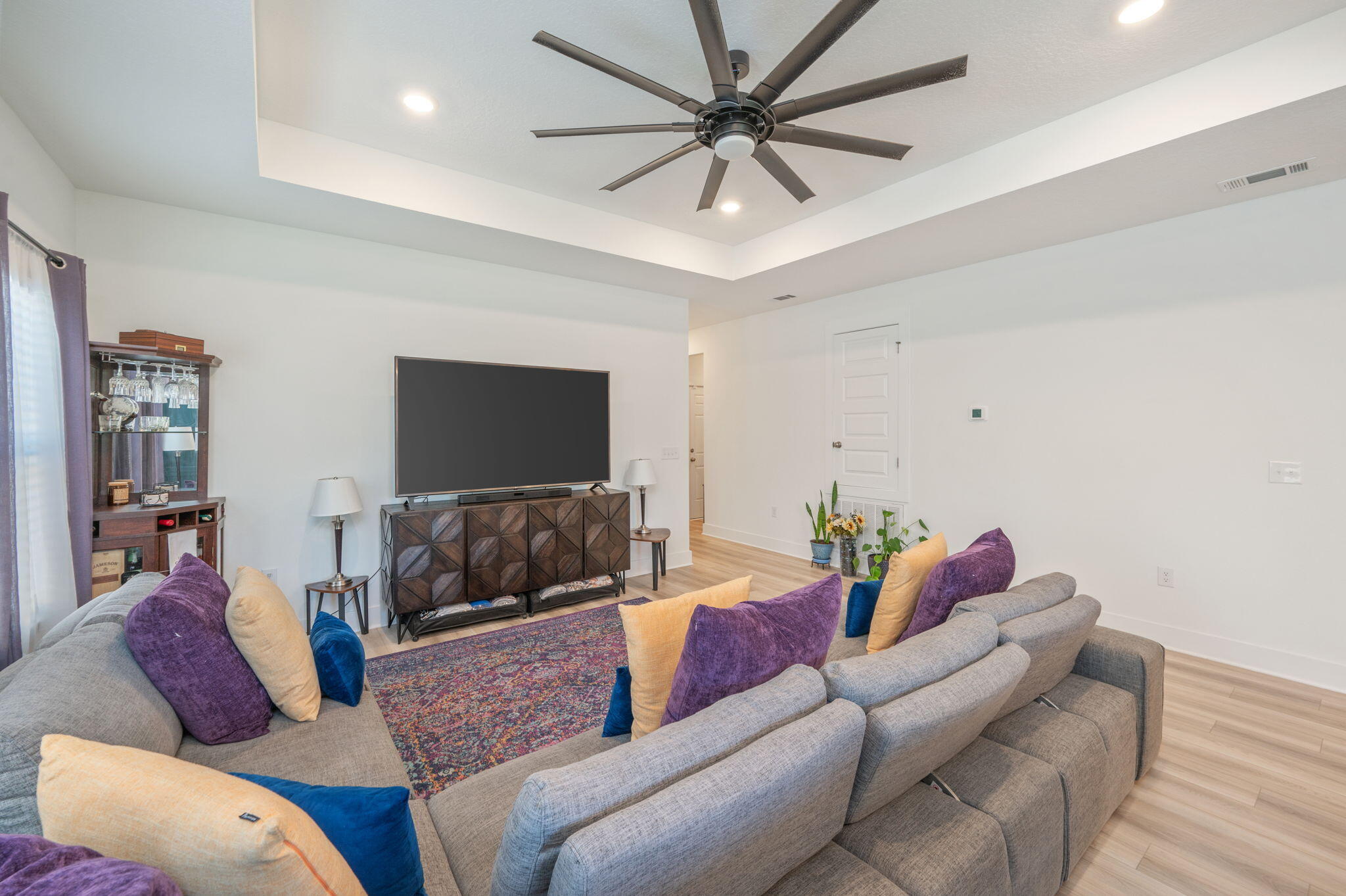 165 Blooming Cove Crestview, FL 32539 - Photo 8 of 44 a living room with furniture and a flat screen tv