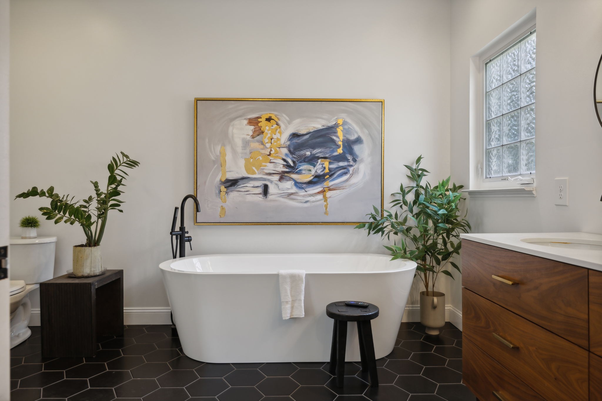 3084 Duplex Road Spring Hill, TN 37174 - Photo 22 of 53 a white bath tub sitting in a bathroom next to a window