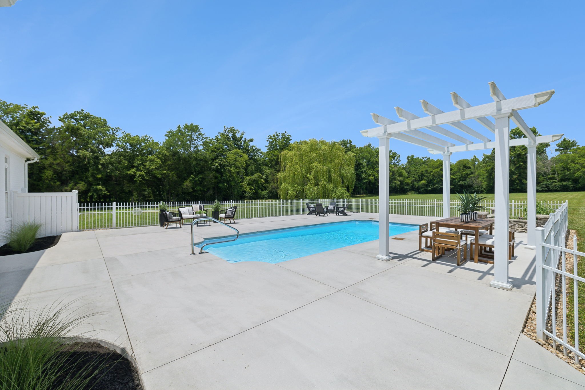3084 Duplex Road Spring Hill, TN 37174 - Photo 31 of 53 a view of a patio with a table and chairs