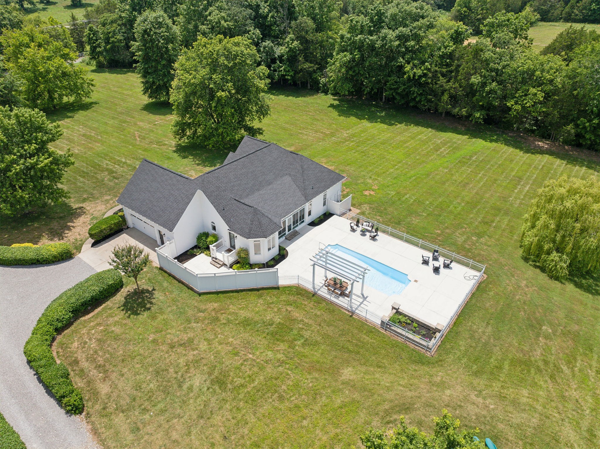 3084 Duplex Road Spring Hill, TN 37174 - Photo 48 of 53 an aerial view of a house with swimming pool and garden