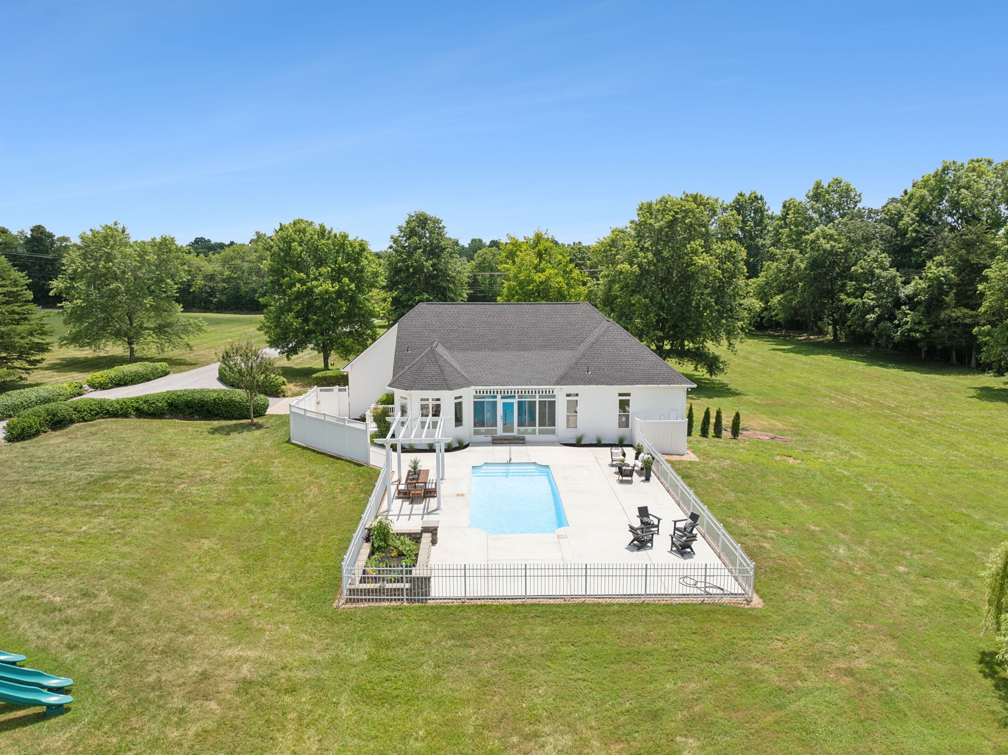 3084 Duplex Road Spring Hill, TN 37174 - Photo 49 of 53 a view of a house with pool and a yard