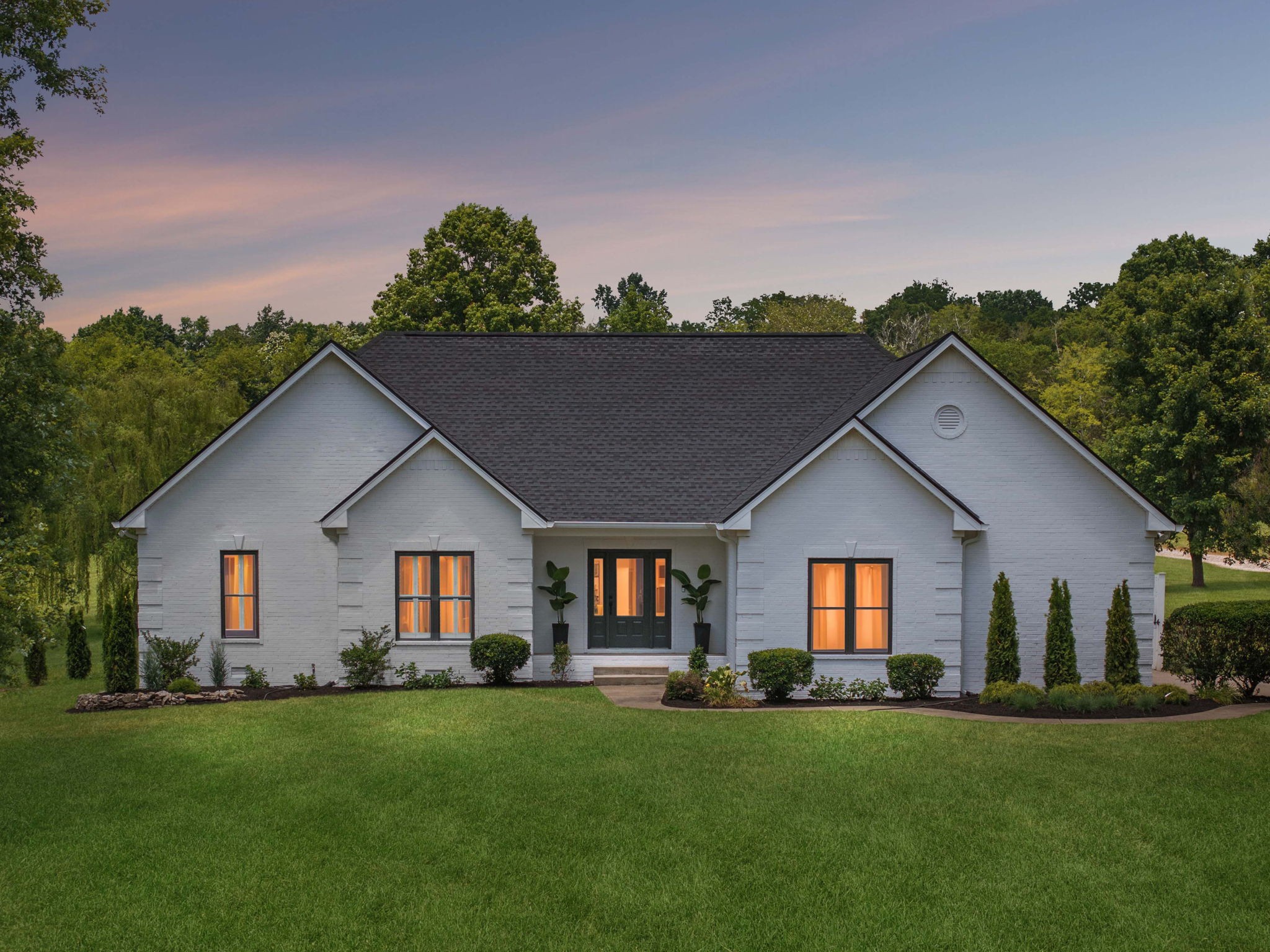 3084 Duplex Road Spring Hill, TN 37174 - Photo 53 of 53 a front view of a house with a yard and garage