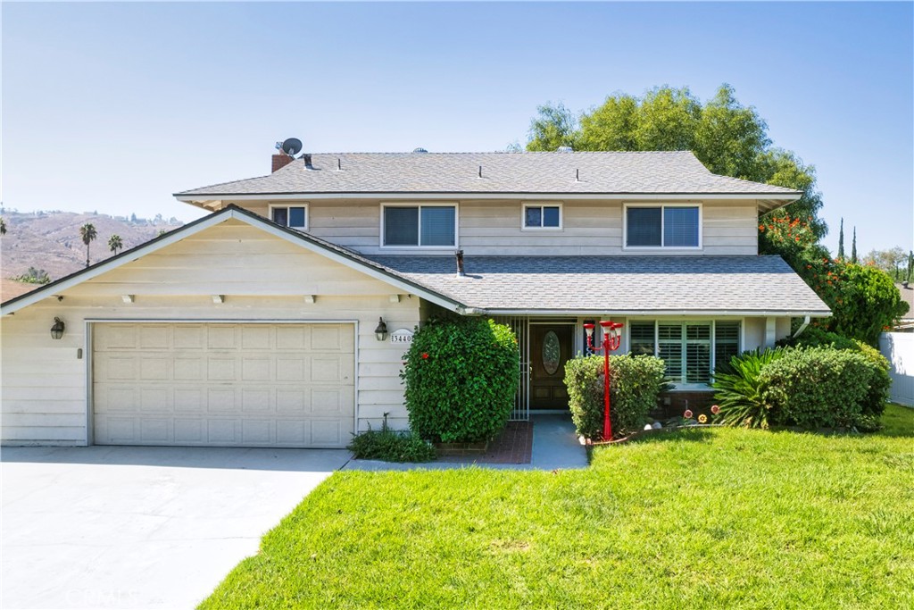 3440 Pickwick Street Riverside, CA 92503 - Photo 1 of 1 a front view of a house with a yard and garage