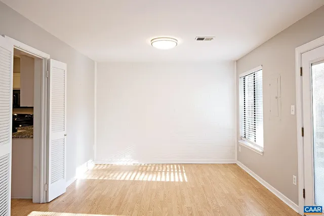 a view of an empty room and window