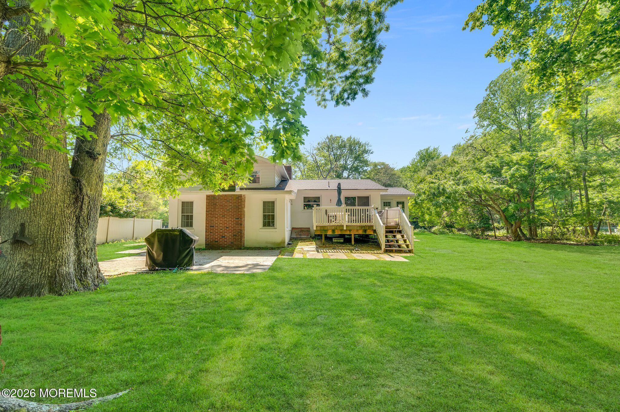 2604 Logan Road Asbury Park, NJ 07712 - Photo 28 of 39 a view of a house with a backyard