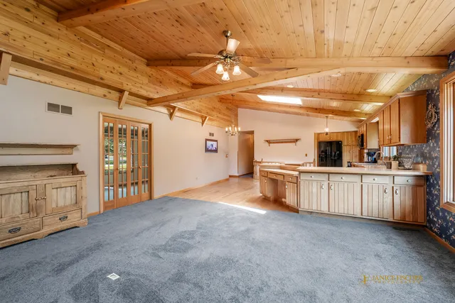 a view of a kitchen with appliances and cabinets