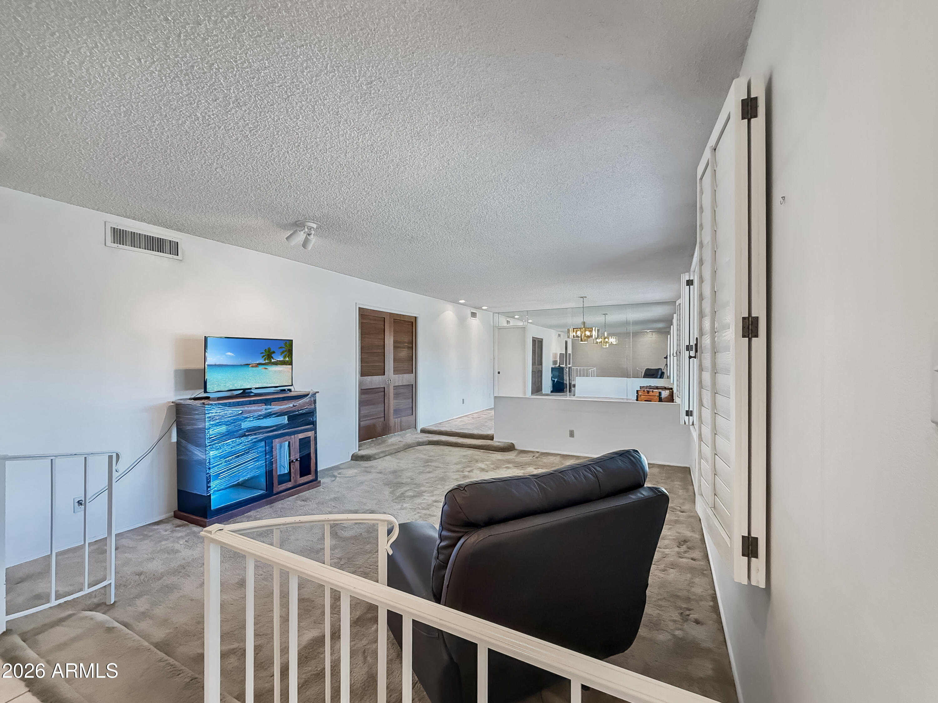 7848 North 5th Avenue Phoenix, AZ 85021 - Photo 4 of 28 a living room with furniture and wooden floor