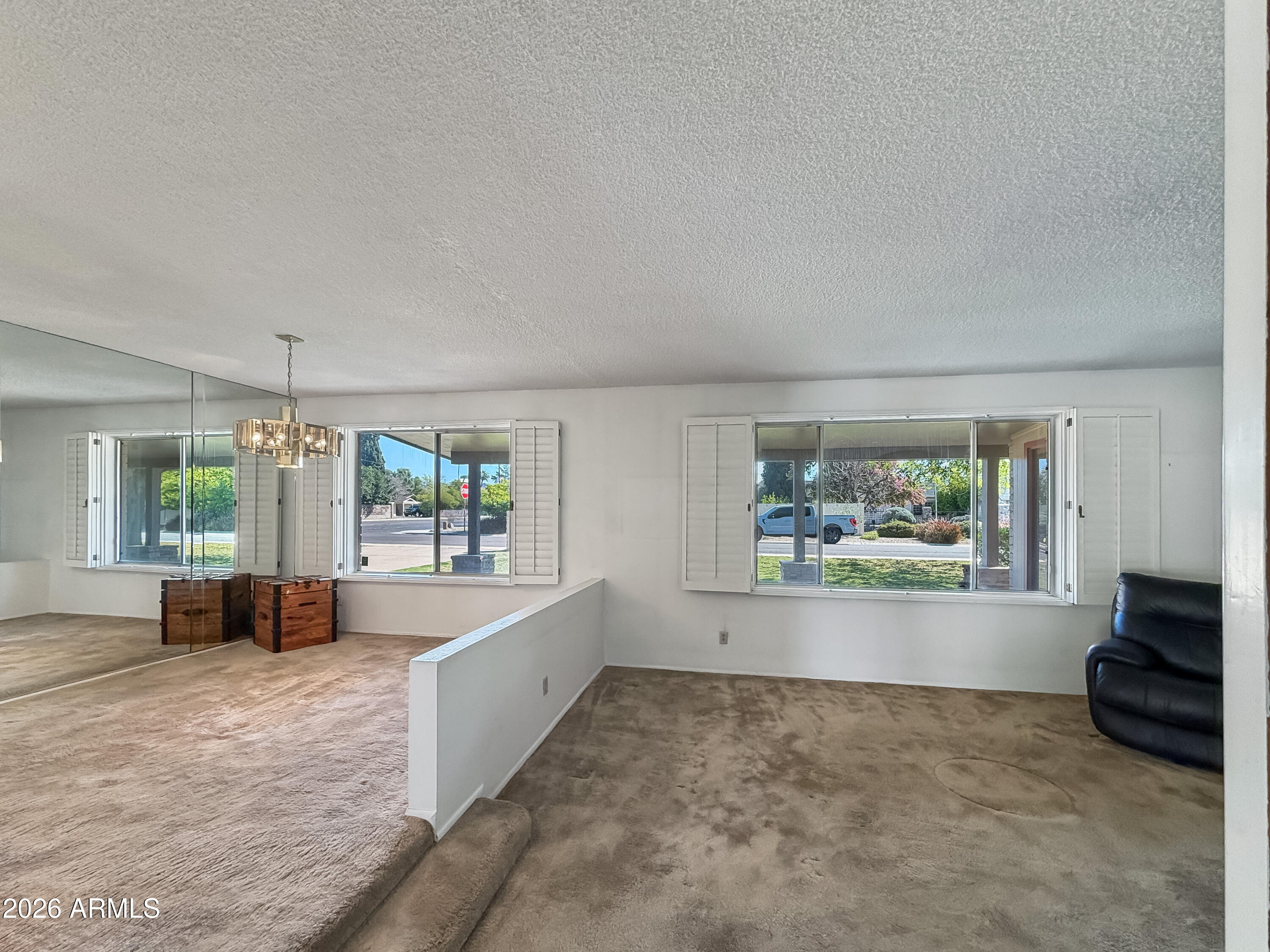 7848 North 5th Avenue Phoenix, AZ 85021 - Photo 6 of 28 a living room with furniture and a large window
