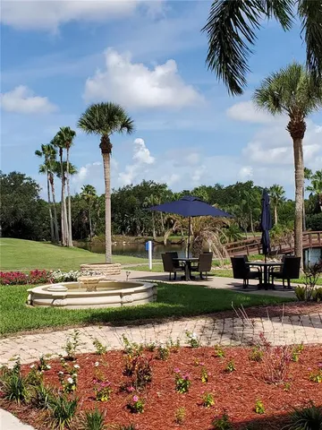 a view of a park with swings and slides