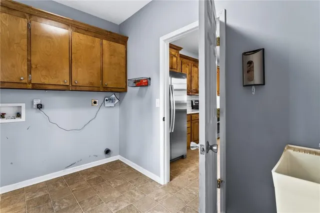 a bathroom with a sink a mirror and a shower