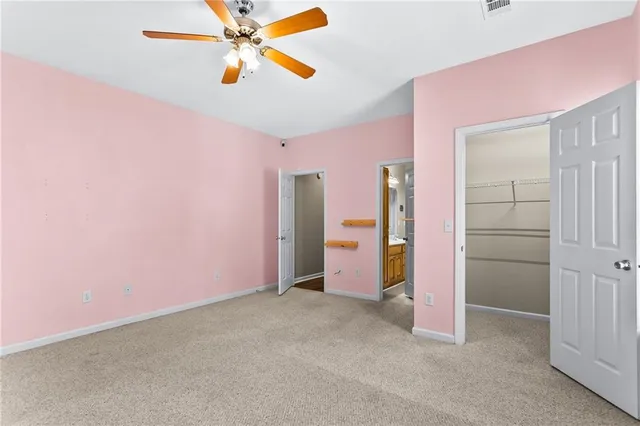 en empty room with windows