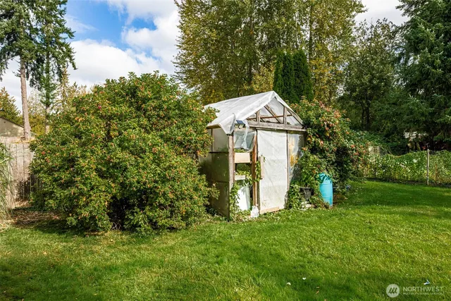a view of a backyard with a garden