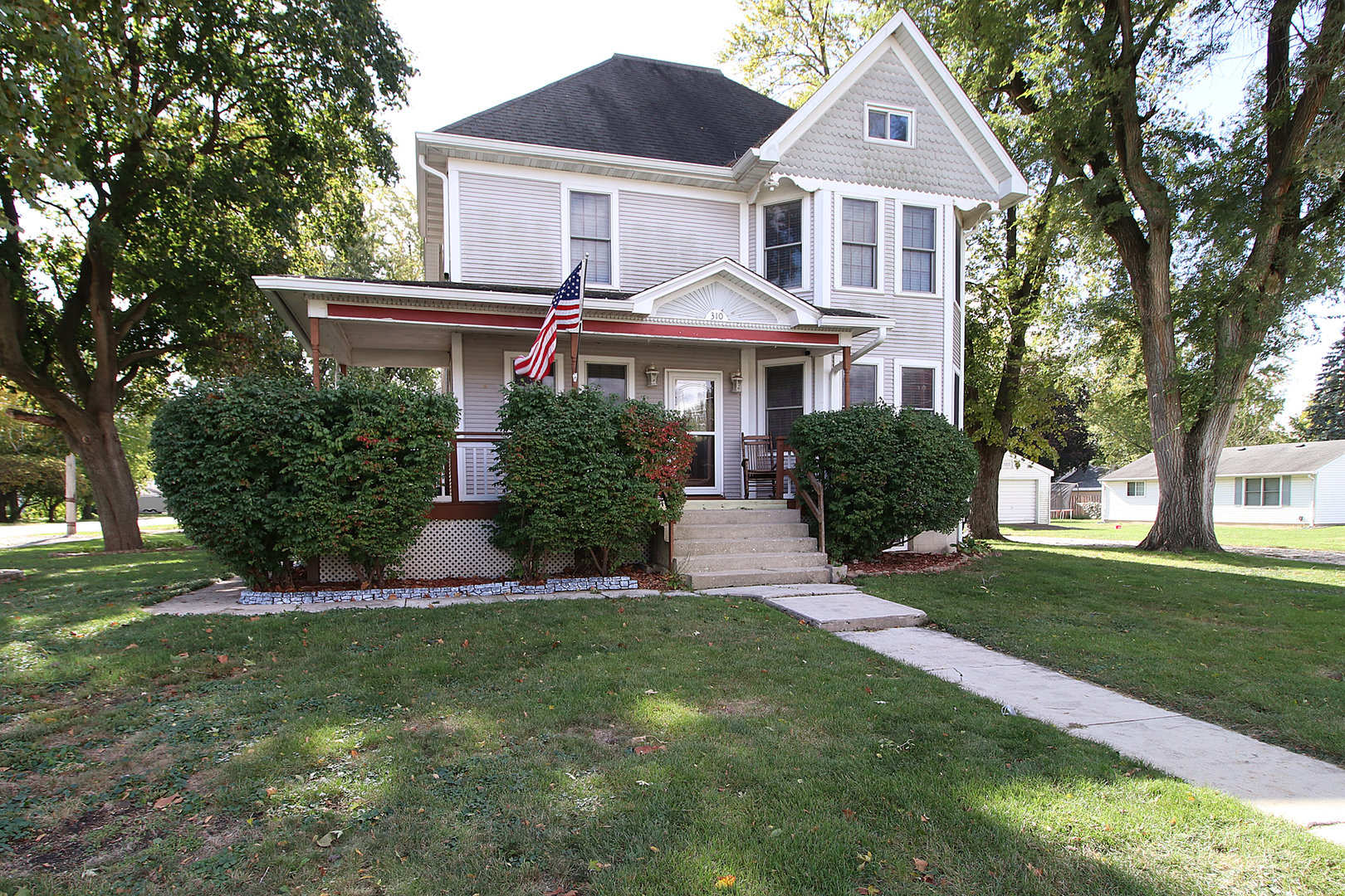 310 East Main Street Gardner, IL 60424 - Photo 1 of 1 a front view of a house with a yard