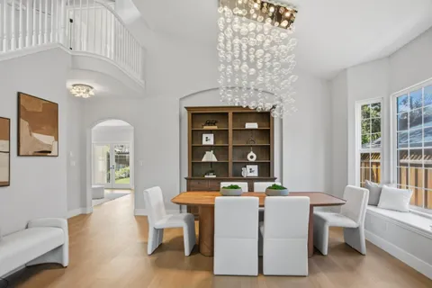 a living room with furniture and window