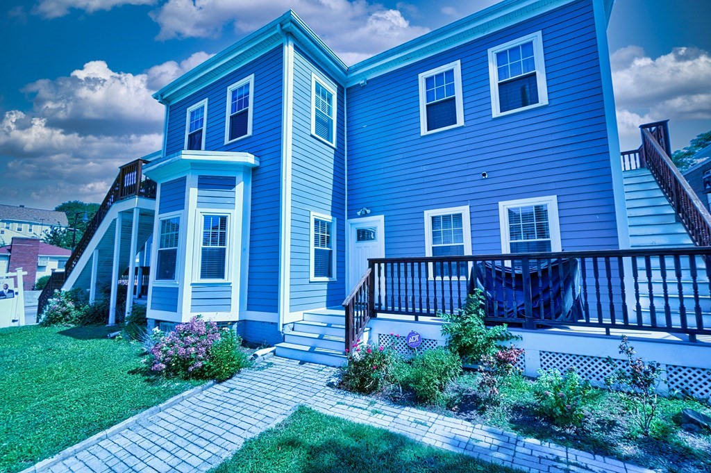 1008-1010 River Street, Unit 1 Boston, MA 02136 - Photo 28 of 29 a front view of a house