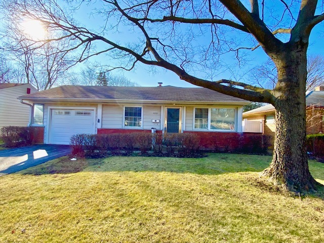 1026 Midway Road Northbrook, IL 60062 - Photo 1 of 17 front view of a house with a yard