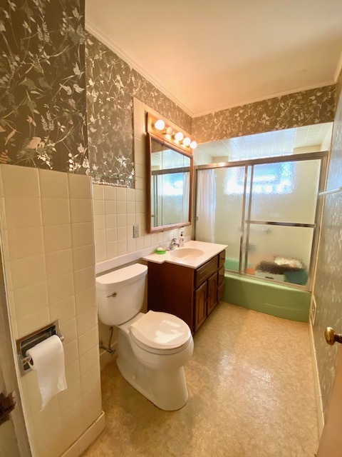 1026 Midway Road Northbrook, IL 60062 - Photo 10 of 17 a bathroom with a double vanity sink toilet and mirror