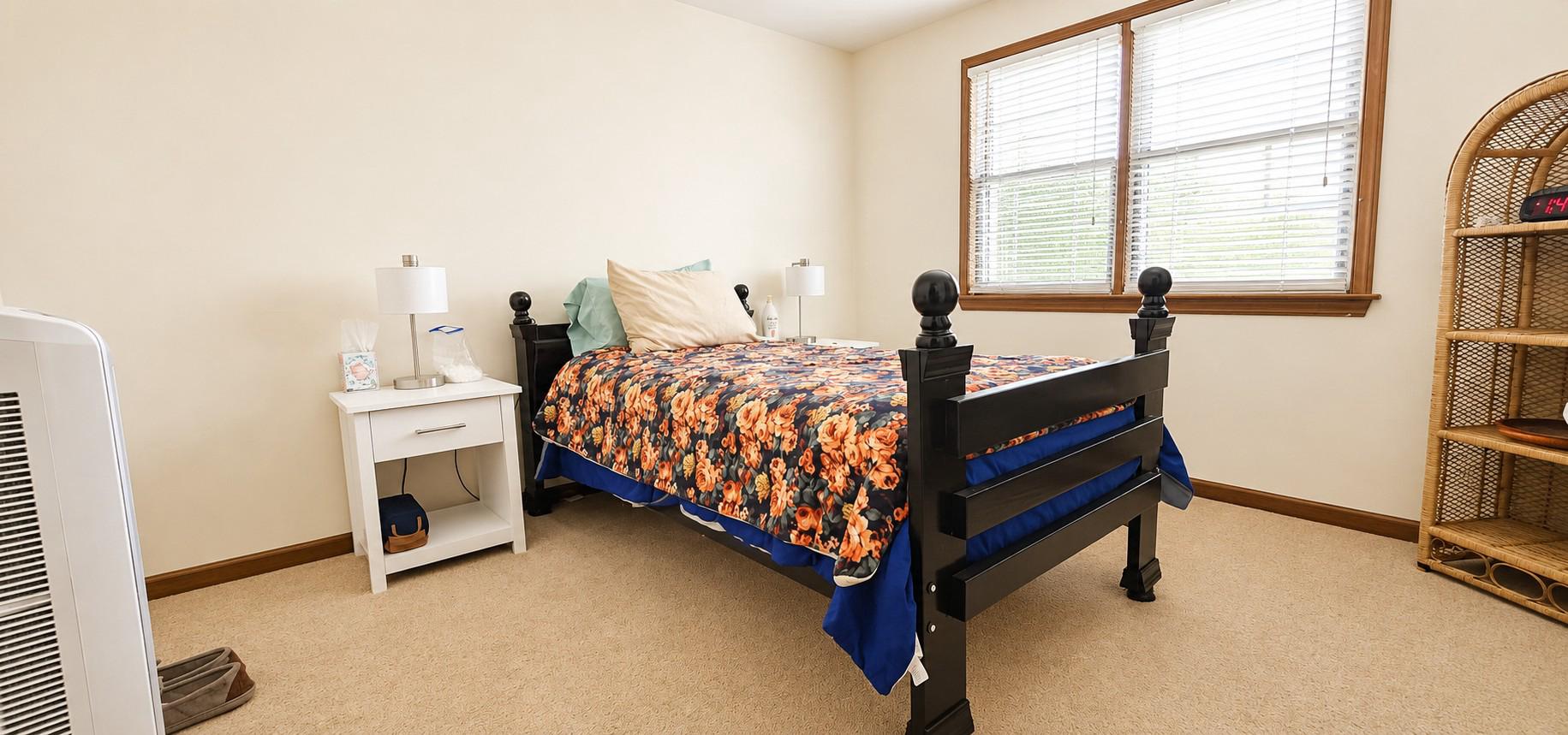 333 McGrath Road Eden, MD 21822 - Photo 15 of 22 a bed sitting in a bedroom next to a window