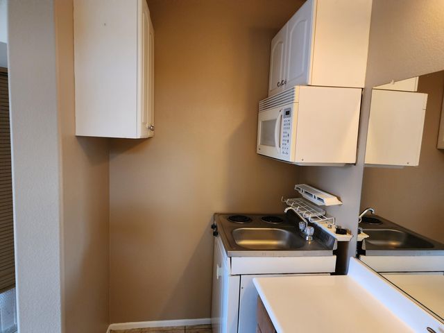 a room with storage and utility